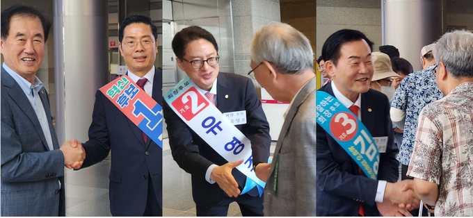 왼쪽부터 구재이·유영조·김완일 한국세무사회장 후보가 회원과 악수하며 지지를 부탁하고 있다.